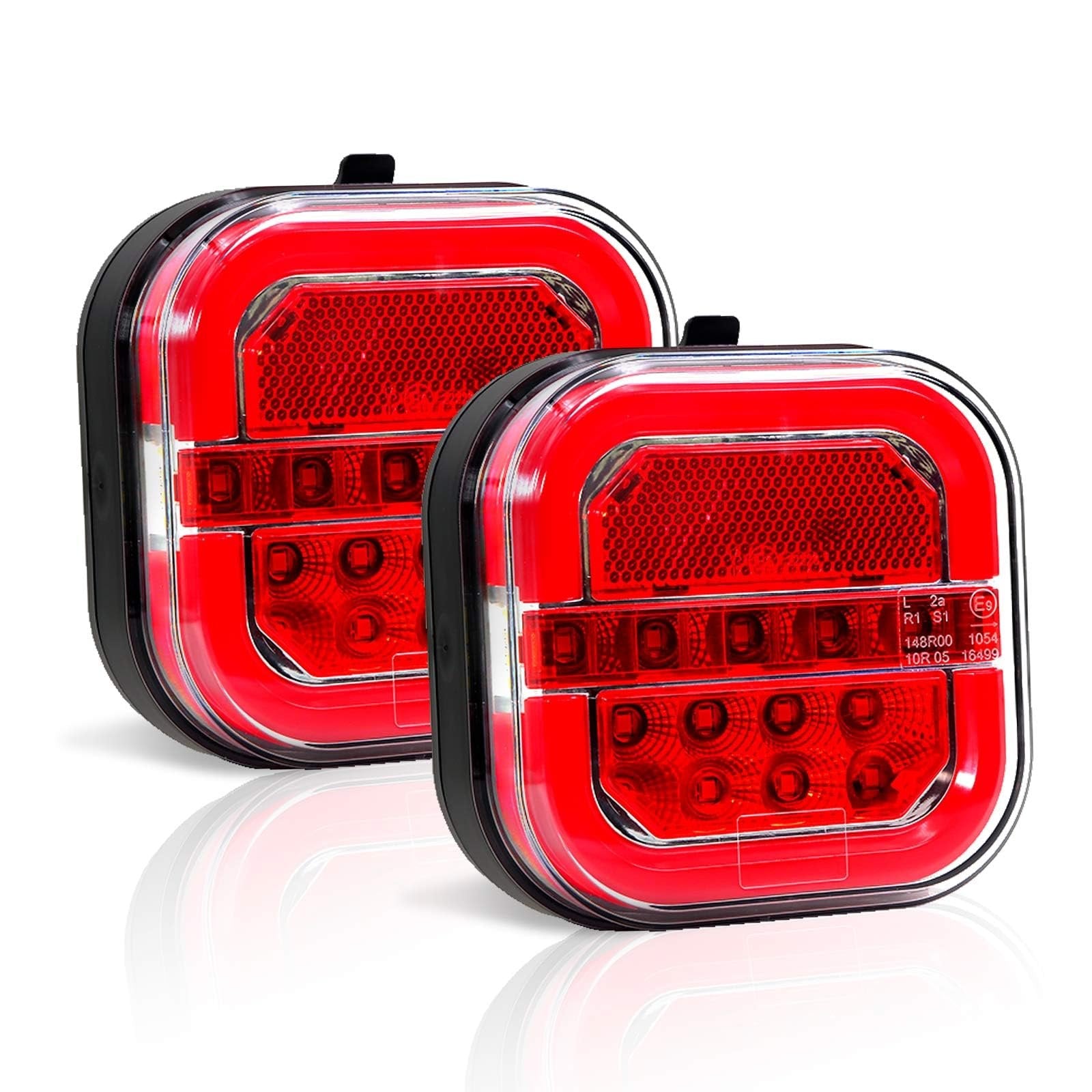 Close-up of two red-lens trailer lamps