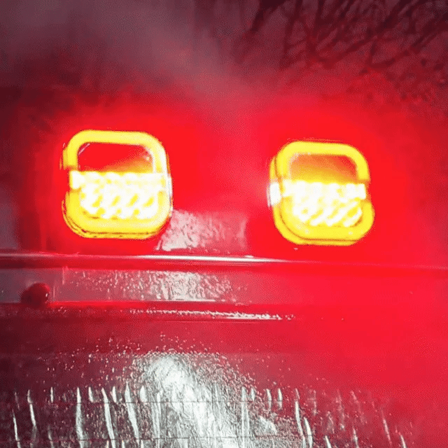 Trailer lamps illuminated during an outdoor water demonstration